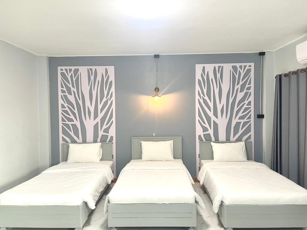 Chainat-Grand-Triple-Room-Bedroom06