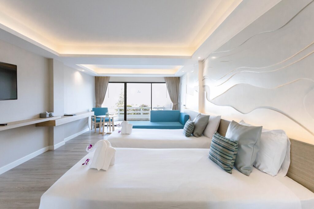 The-Cha-Am Me-tha-va-lai-Deluxe-Room-Bedroom-01