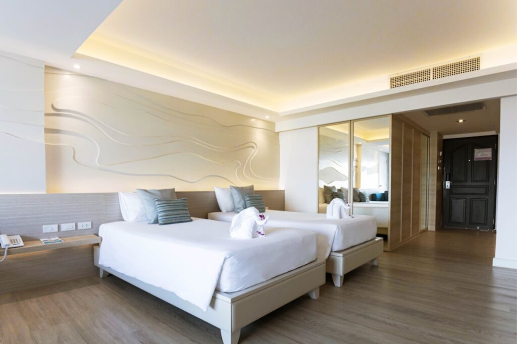 The-Cha-Am Me-tha-va-lai-Deluxe-Room-Bedroom-04